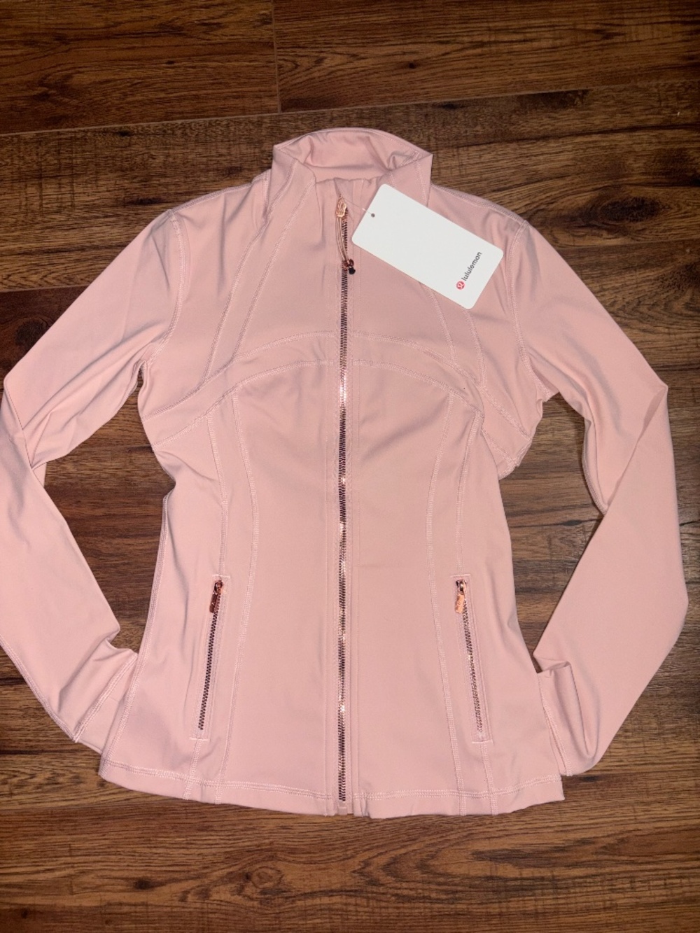 lulu define jacket 4 Pink Haze with golden zippers.